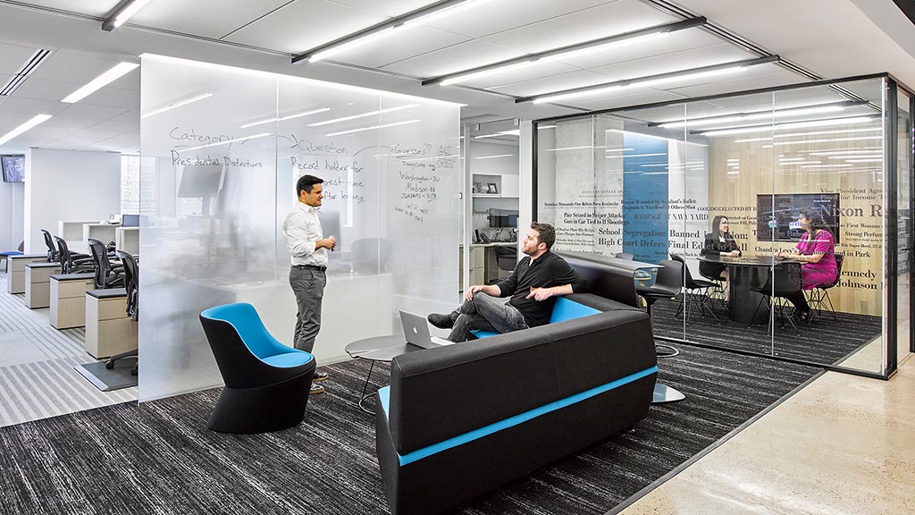 A person sitting on a couch.