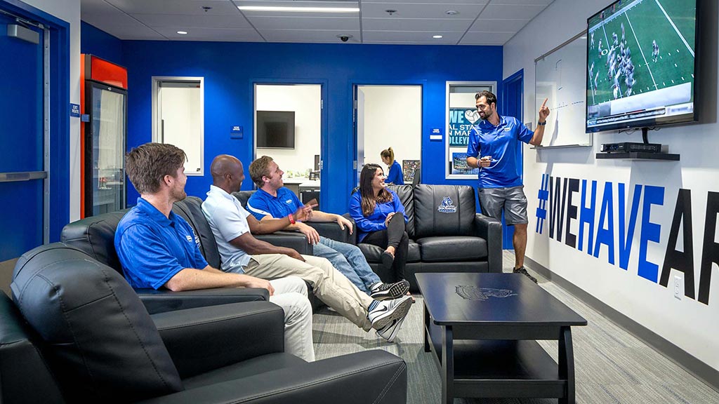 A person giving a presentation to a group of people.