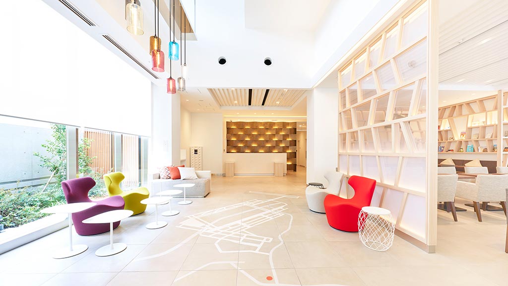 A room with a white floor and a white tiled floor.