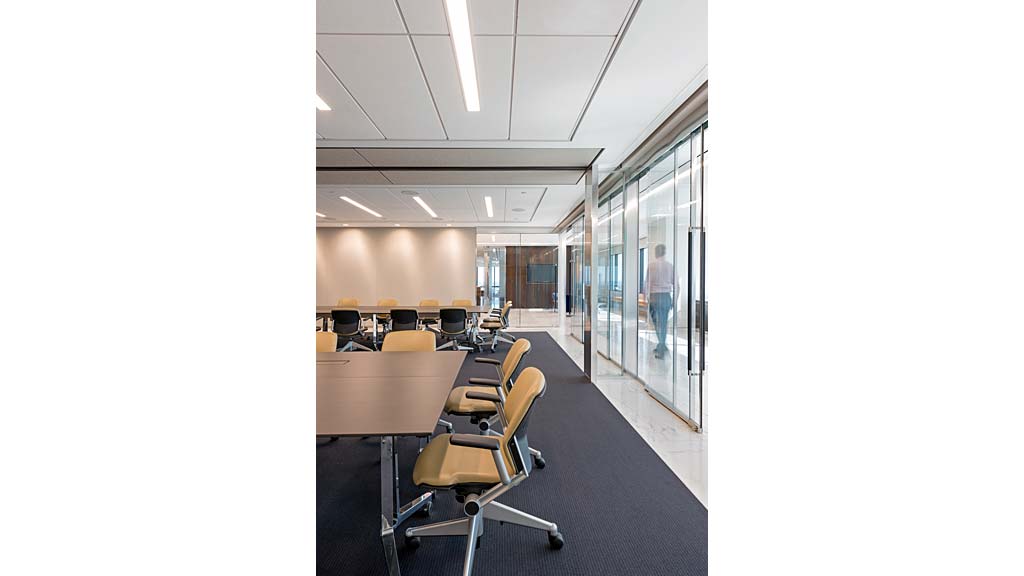 An empty office with a glass wall.