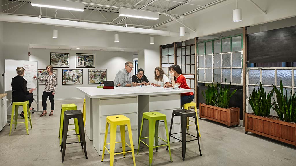 A group of people in a room.