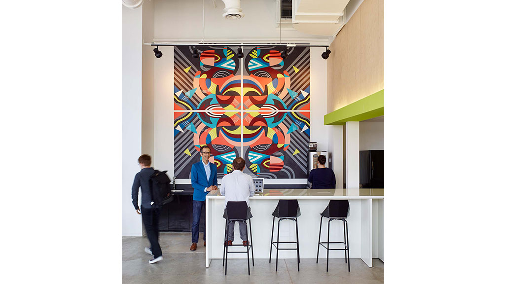 A group of people looking at a large map.