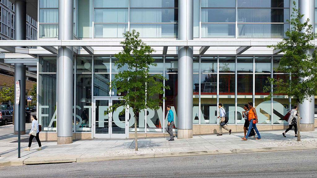 People walking on the sidewalk.