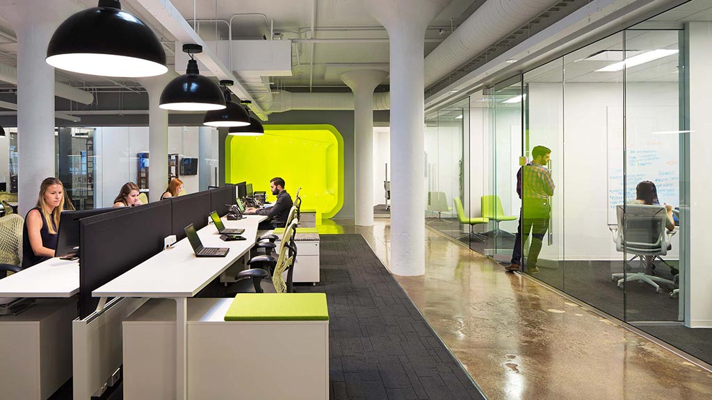 A group of people in an office.