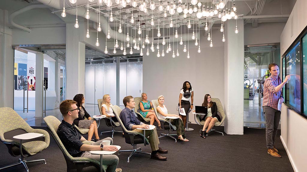 A group of people in a room.