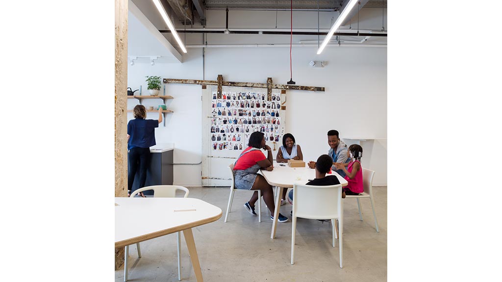 A group of people sitting at a table.