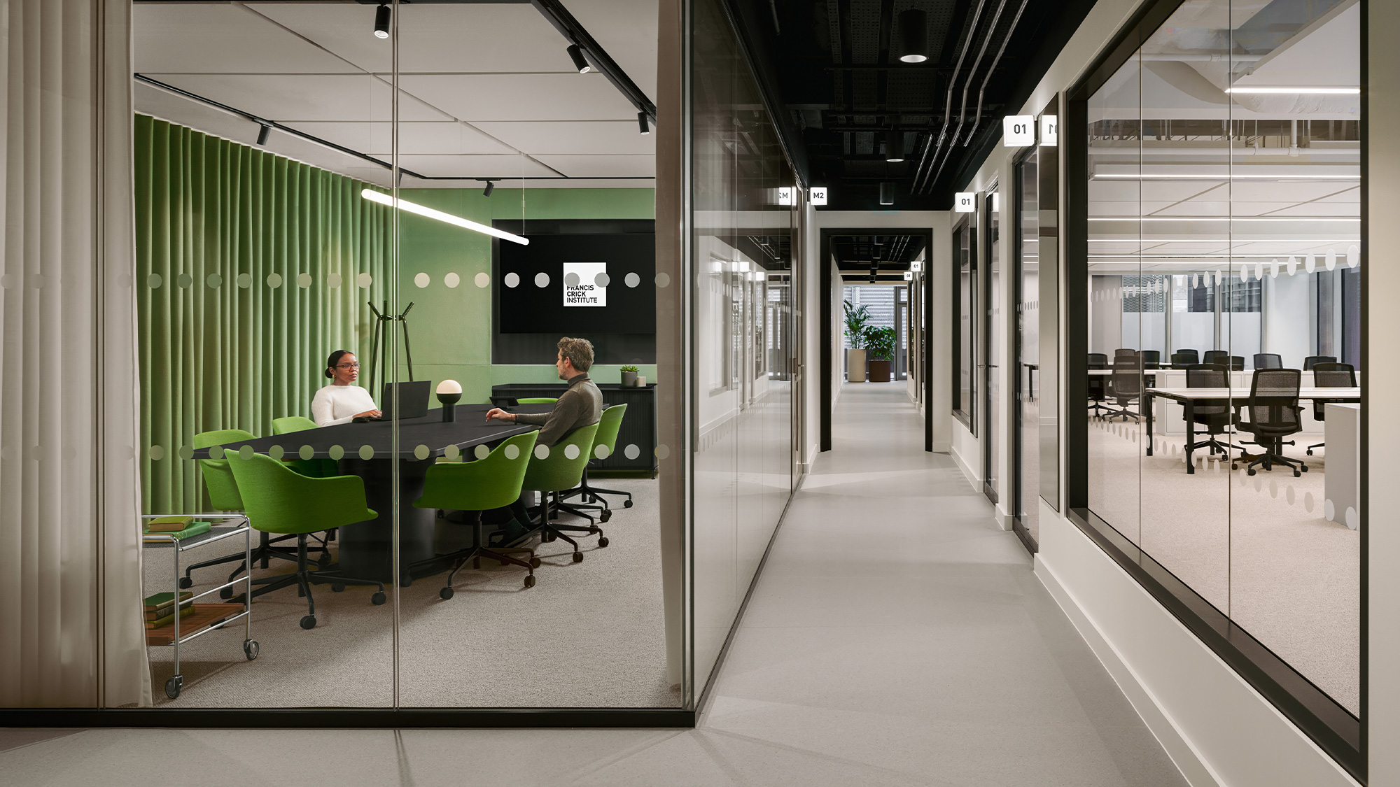 A few men sitting at a table.