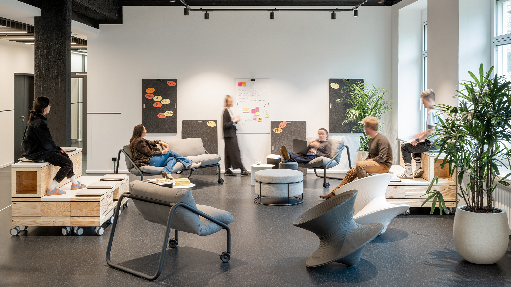 A group of people in a room.