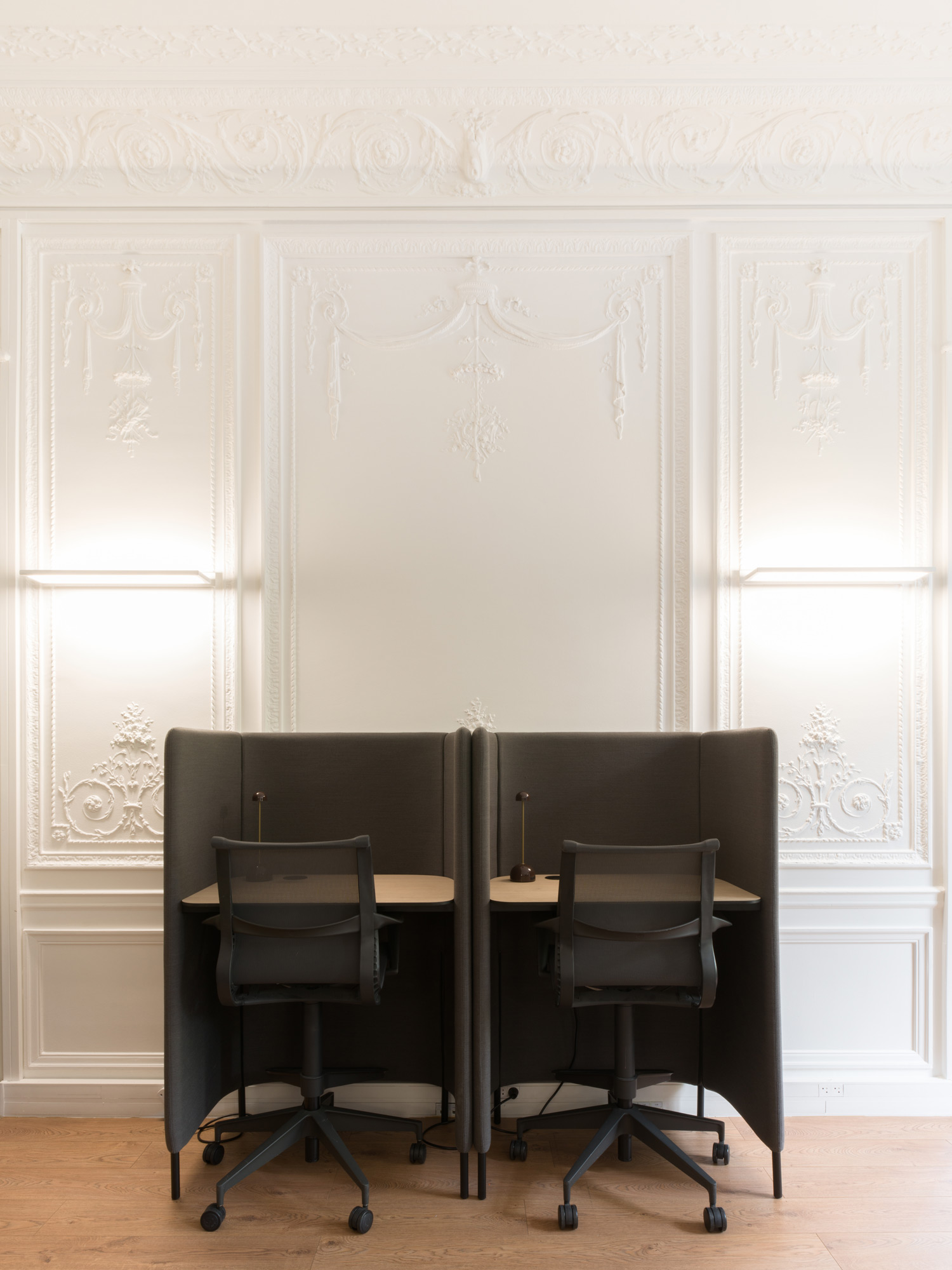 A table with chairs around it.
