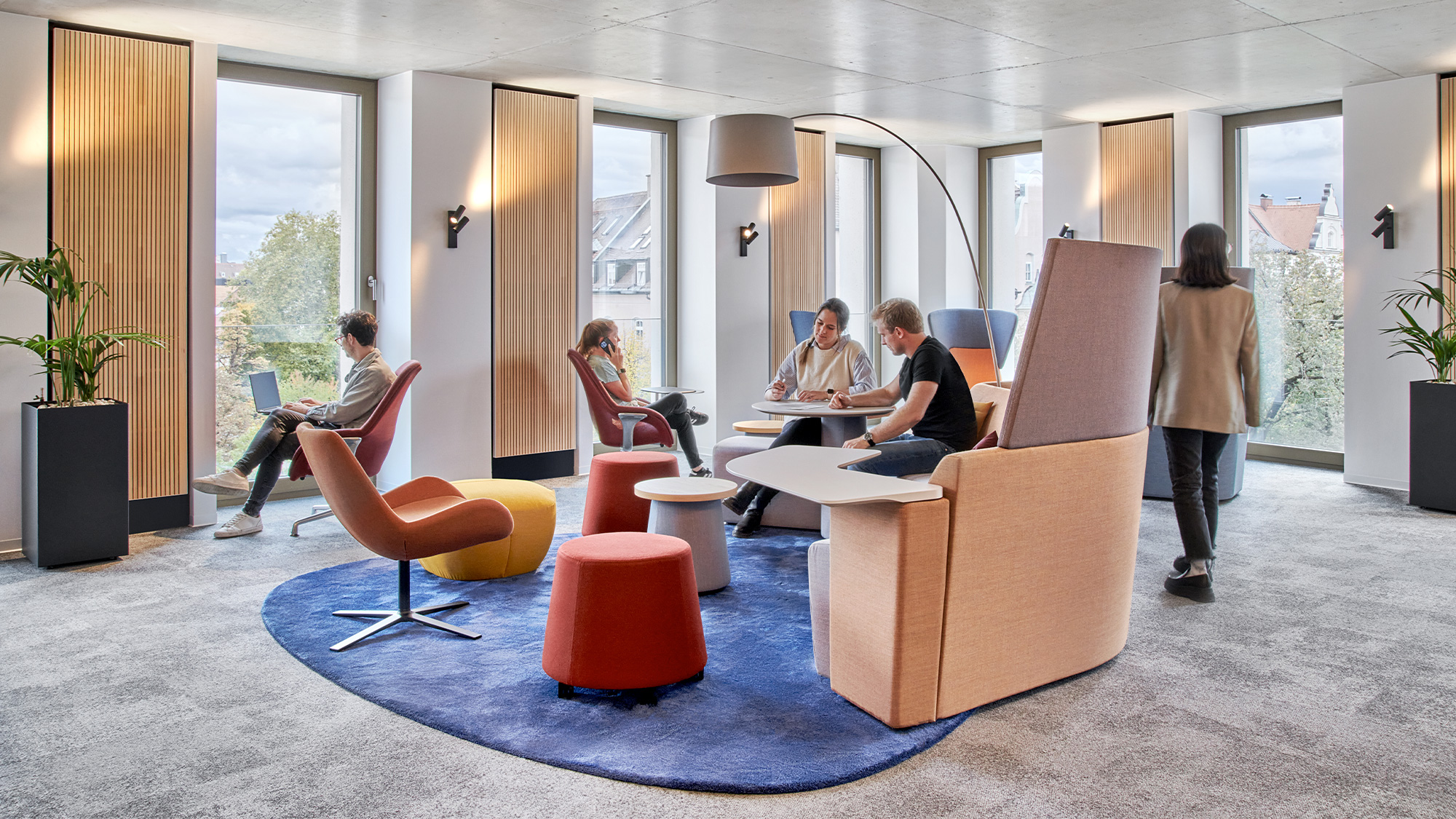 A group of people sitting in chairs.