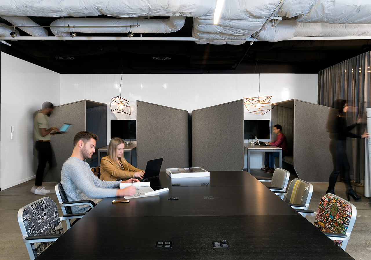 A group of people in a conference room.