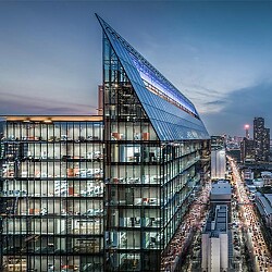 A building with a glass wall.
