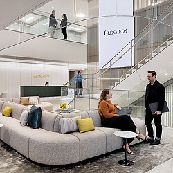 A person sitting on a couch.