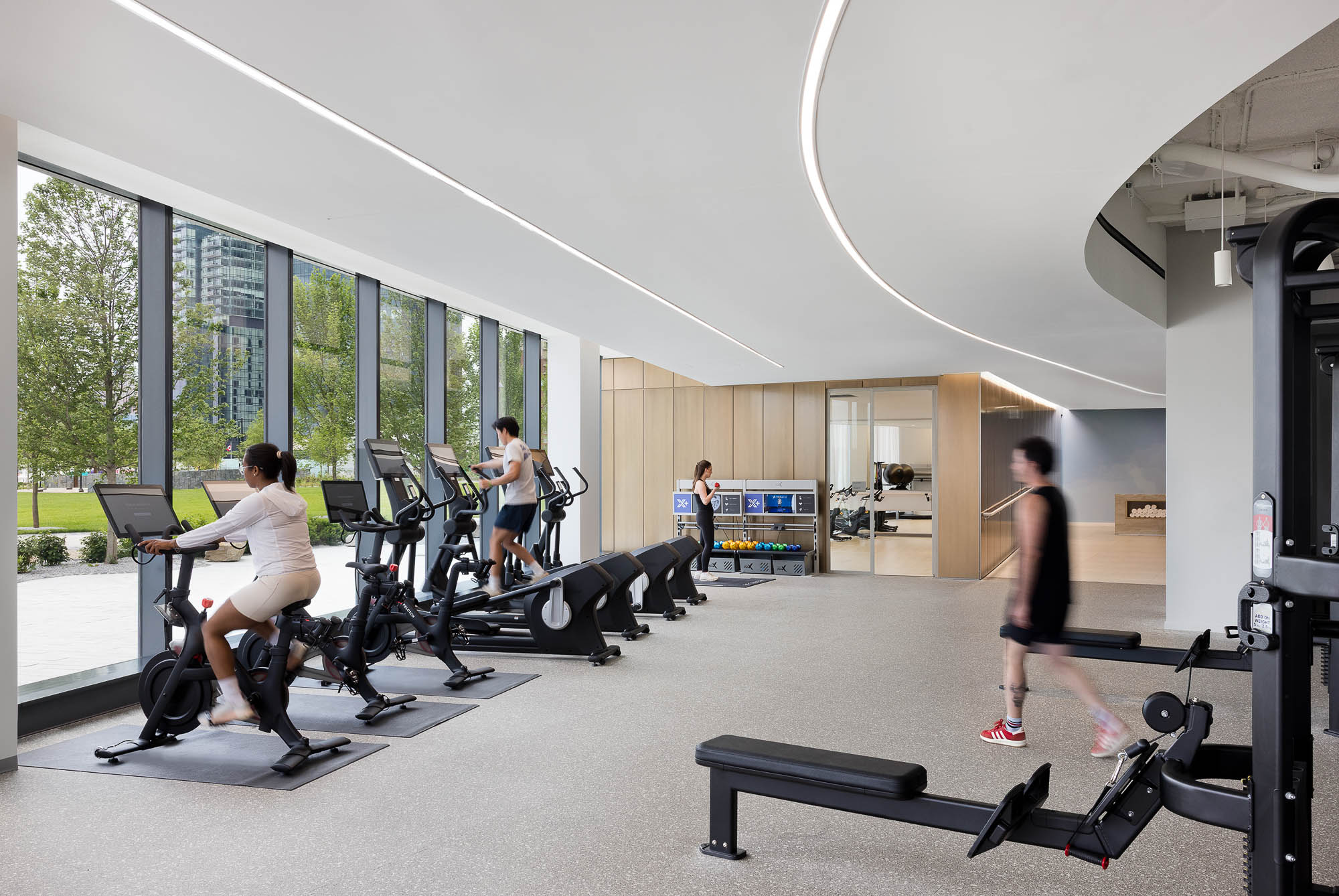 People exercising in a gym.