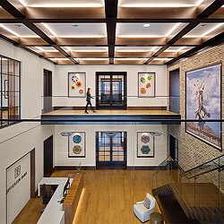 A room with a table and chairs.