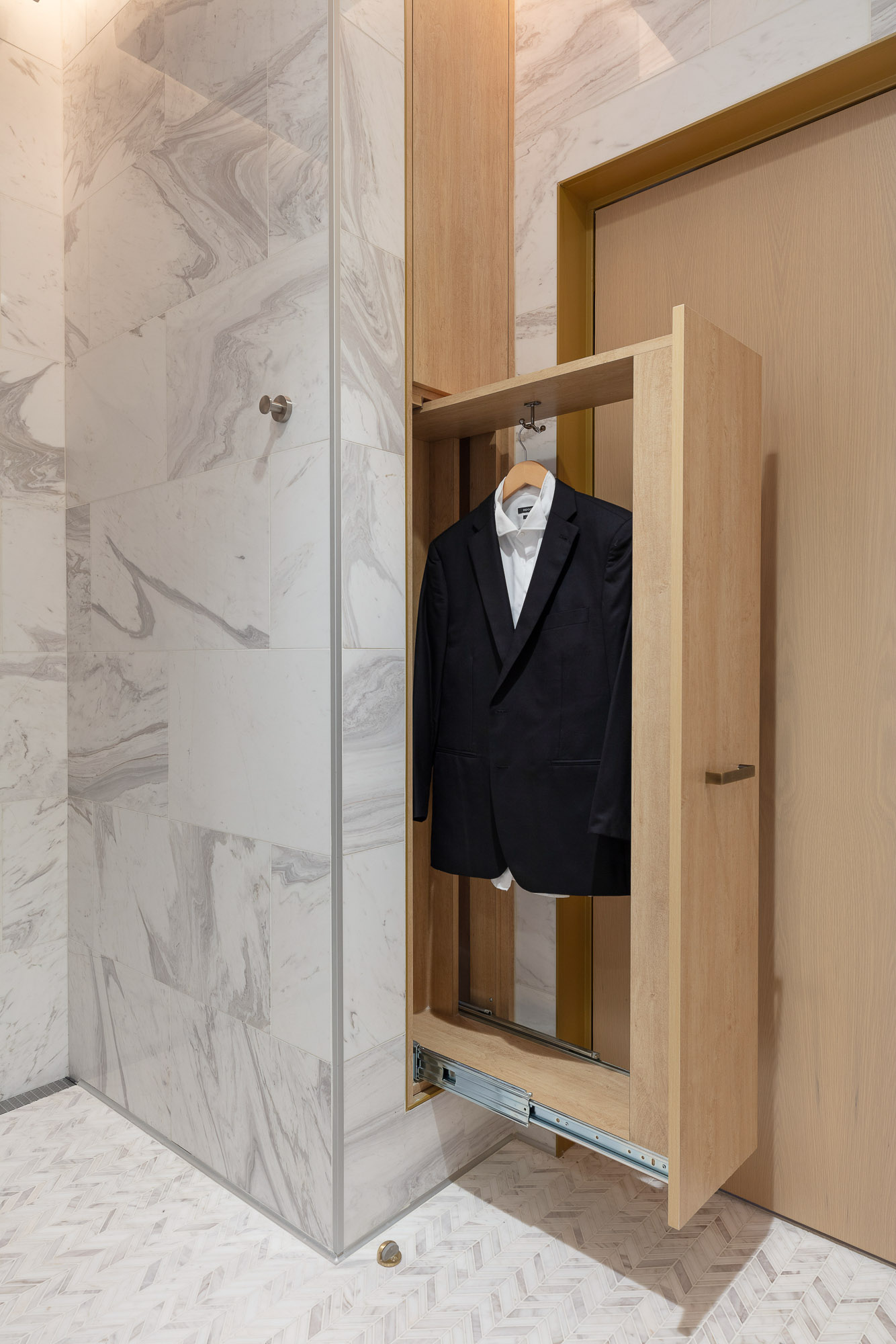 A coat in a closet.