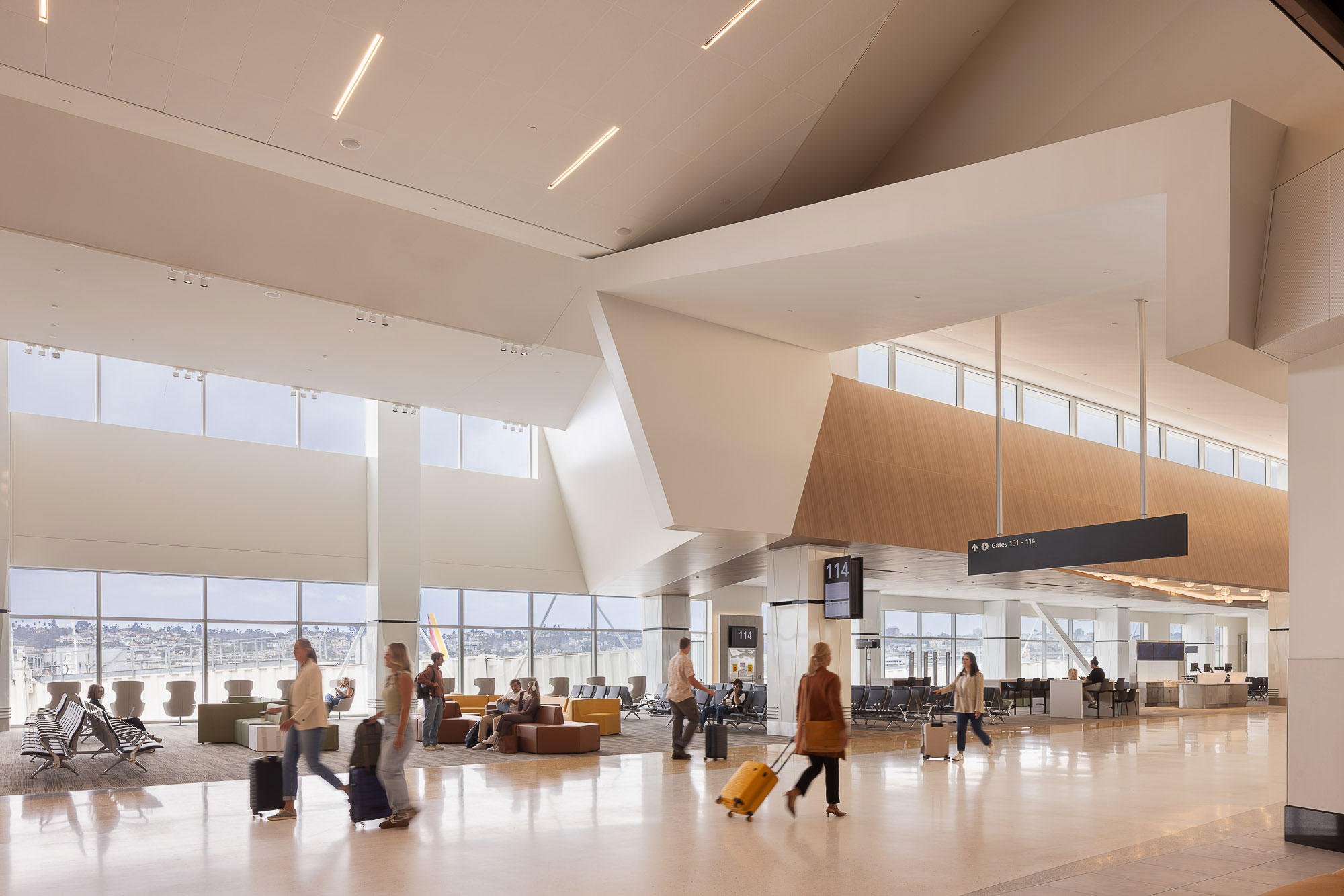 A group of people in an airport.