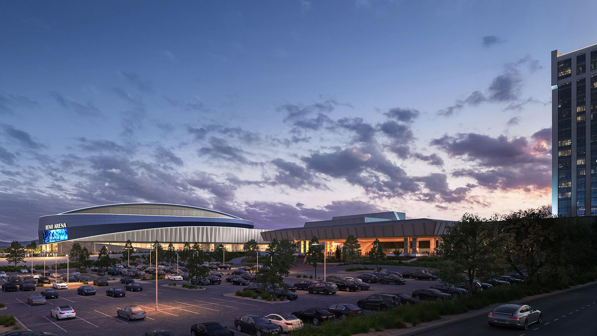 A large building with a parking lot.