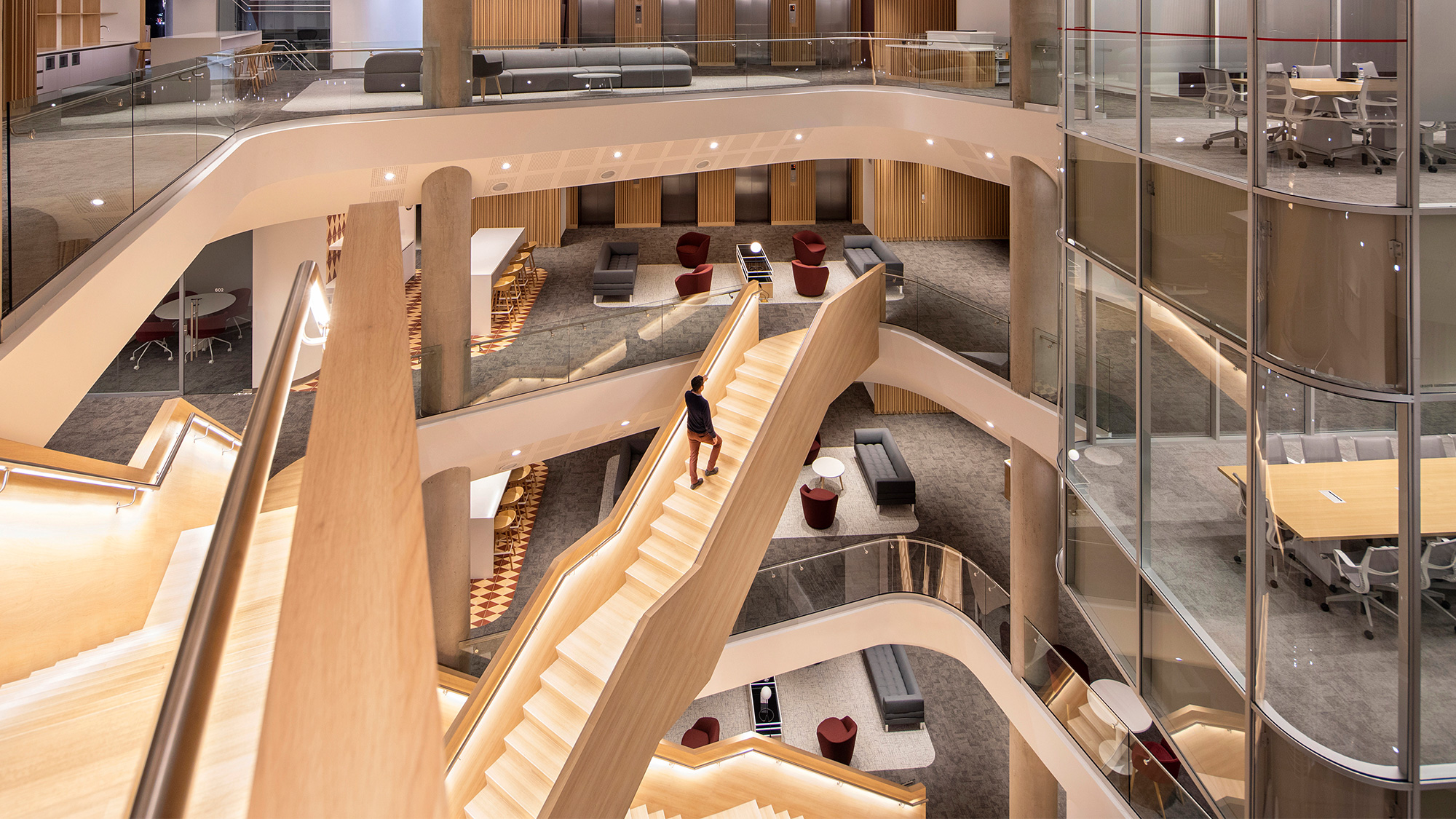 A person walking down a flight of stairs.