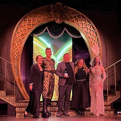 A group of people on a stage.