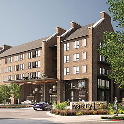 A large building with a parking lot.