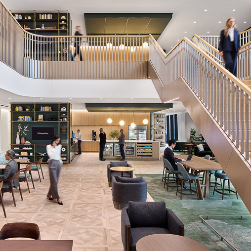 People walking up a staircase.