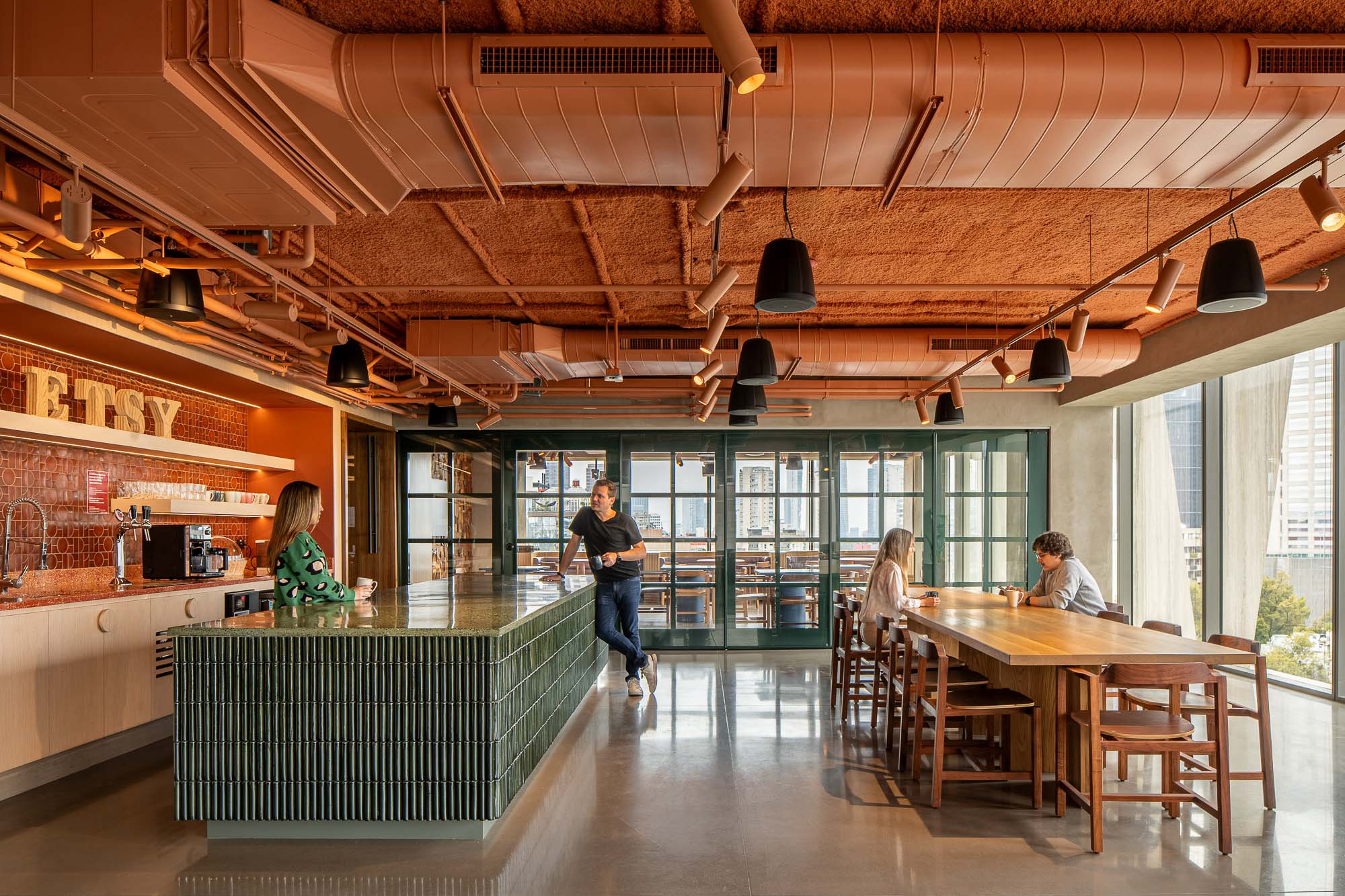 A man and woman in a restaurant.