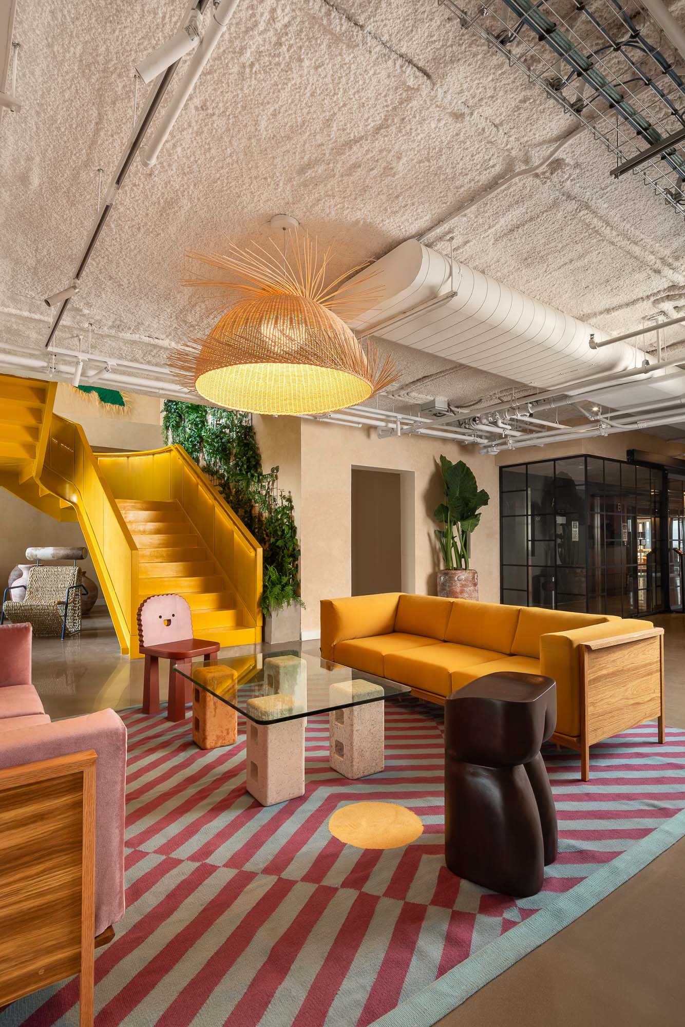 A room with a couch and a table.