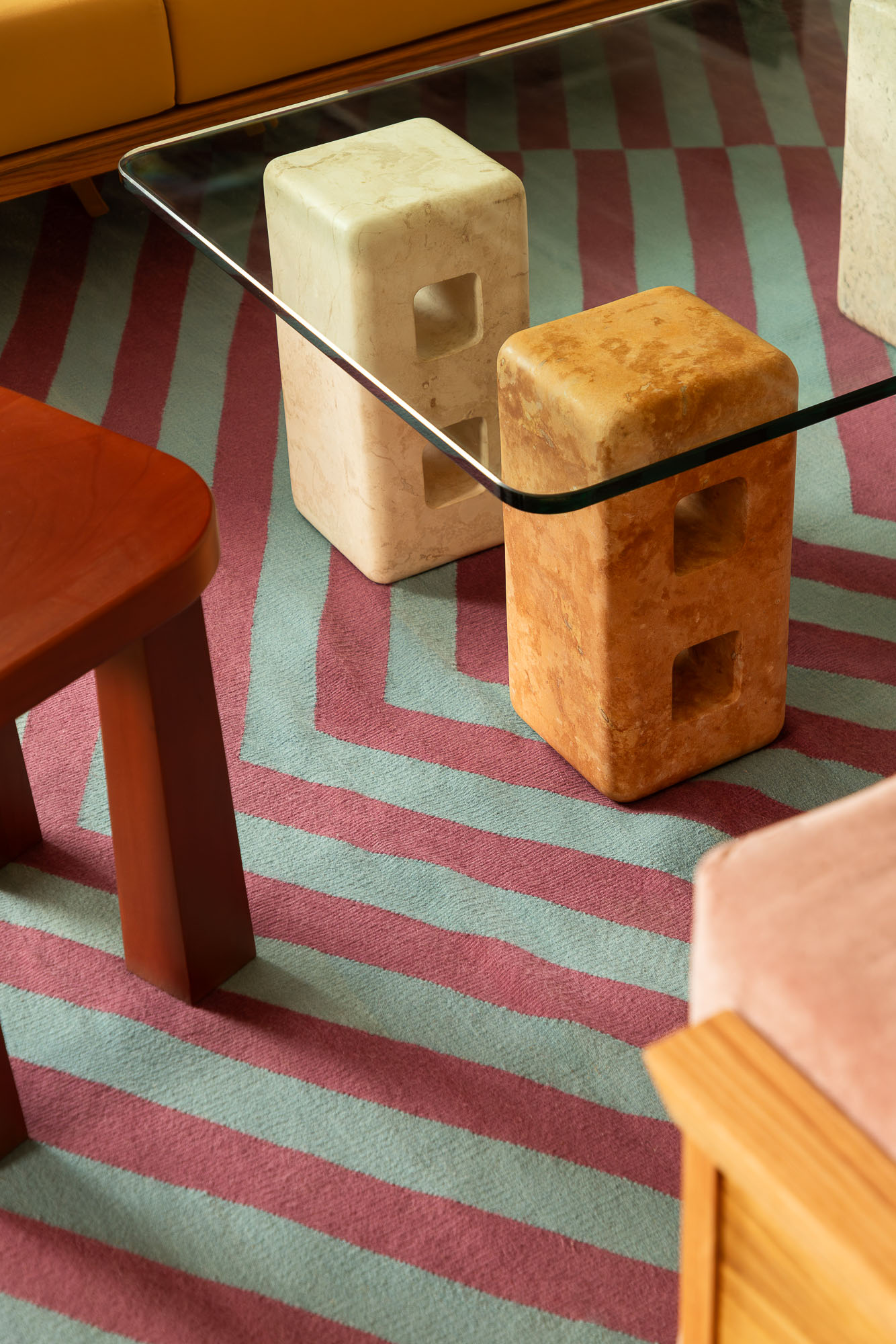A wooden chair with a wooden handle.