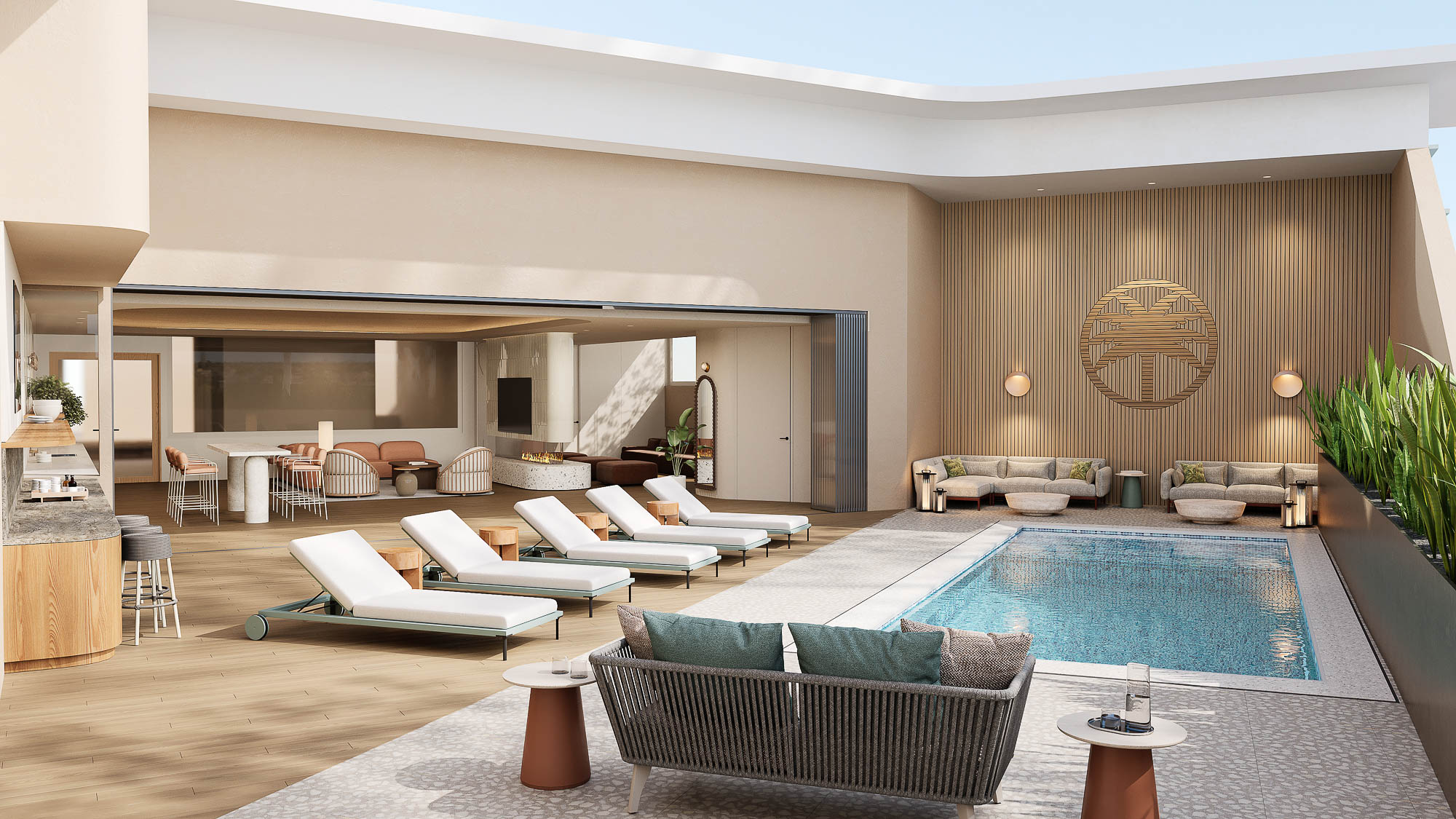 A large room with a pool and couches.