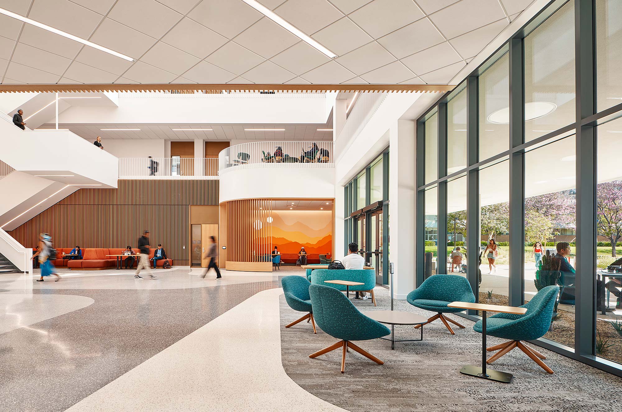A large room with tables and chairs.