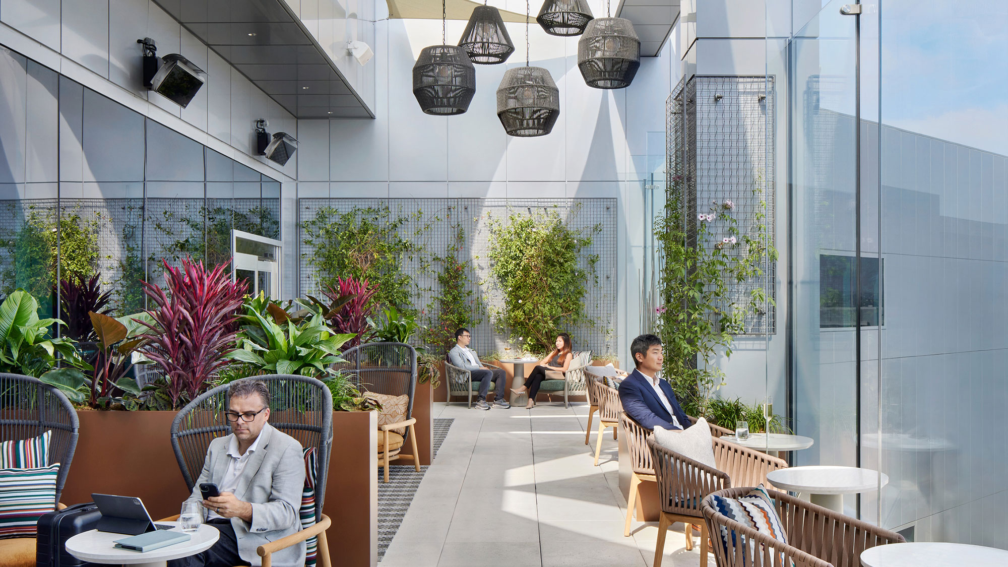 A group of people sitting in chairs.