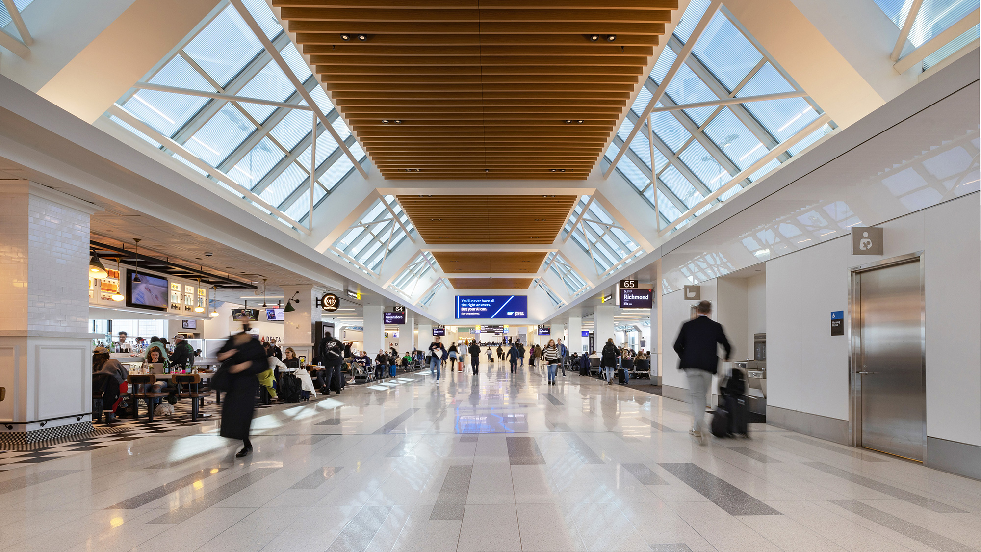 A group of people in an airport.