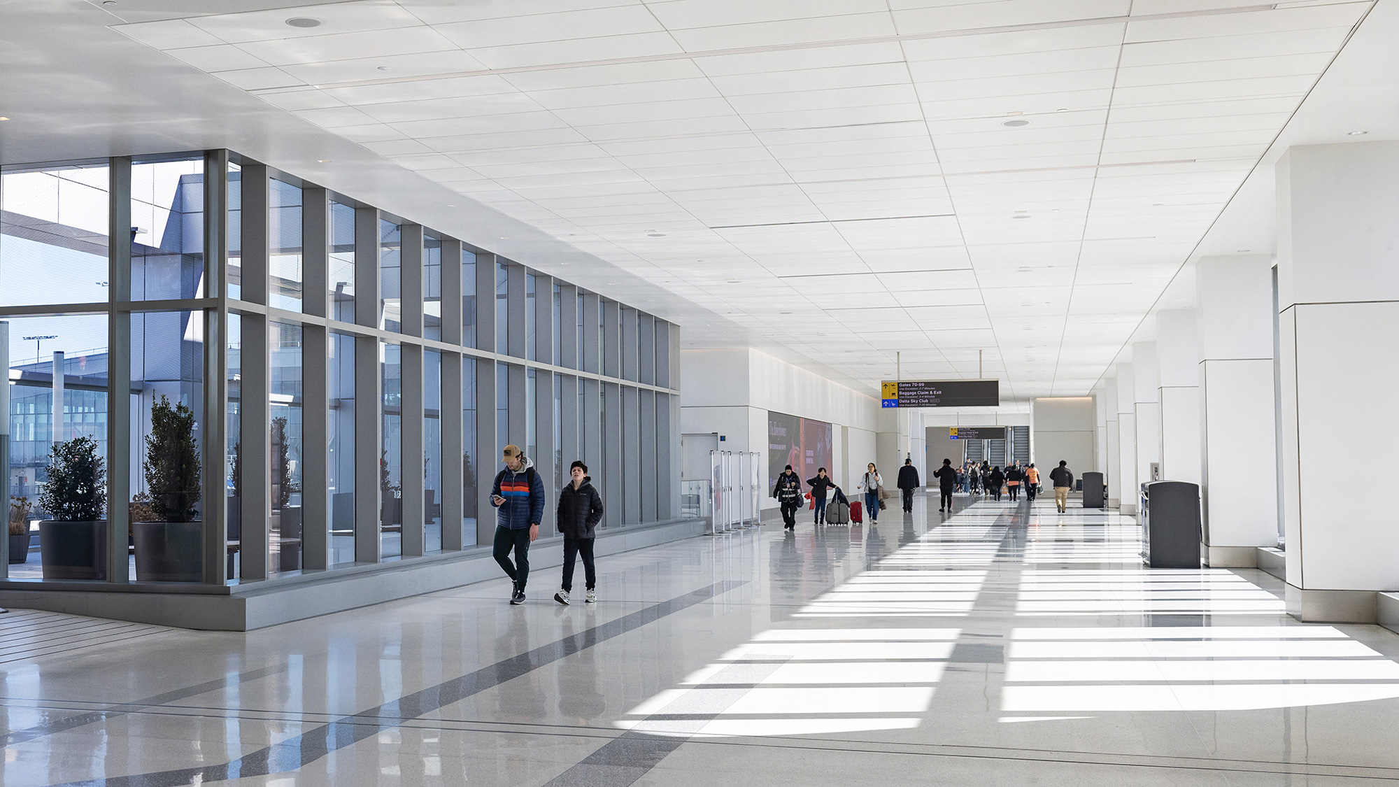 People walking in a large building.