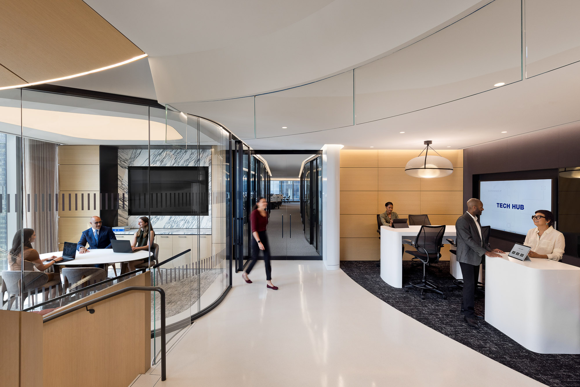 A group of people in a room.