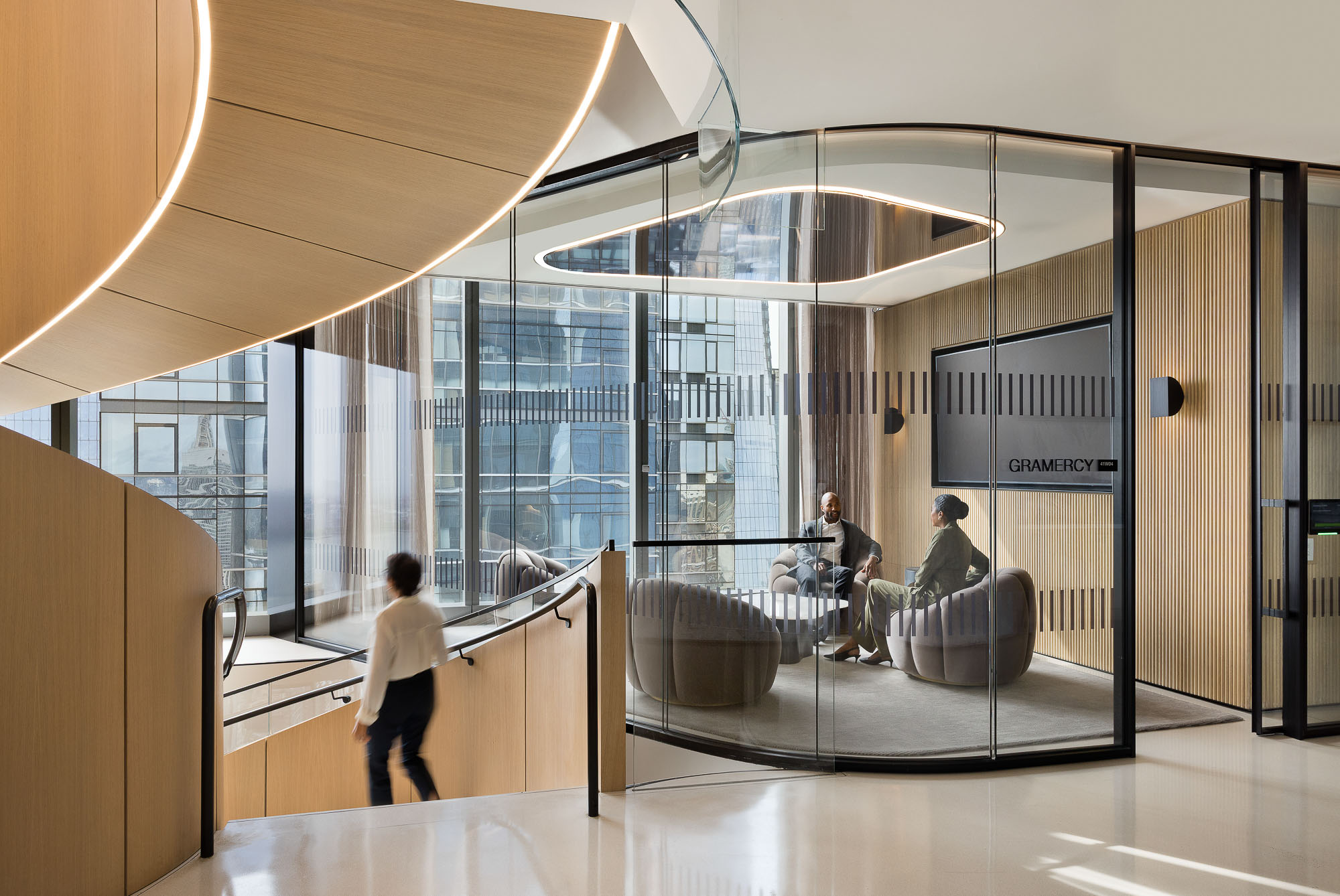 A person walking in a room.