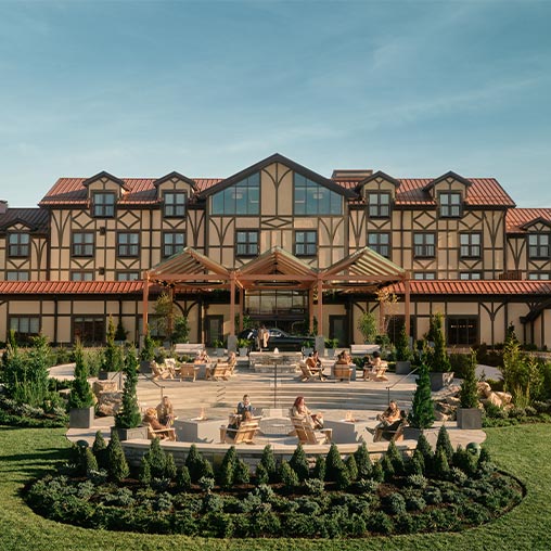 A building with a garden in front of it.