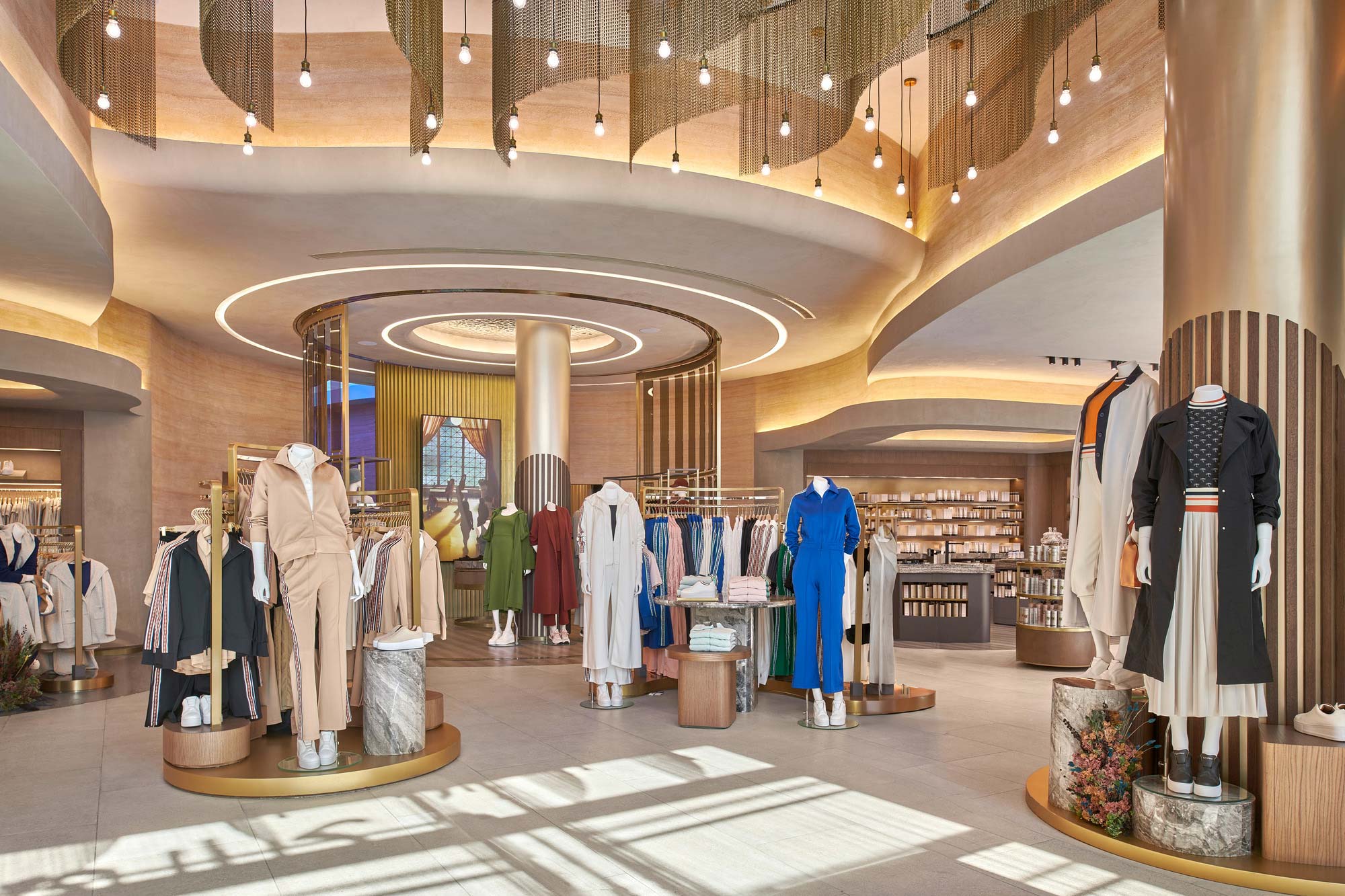 A room with a large display of clothing.