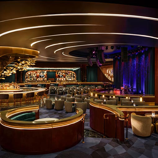 A room with tables and chairs.