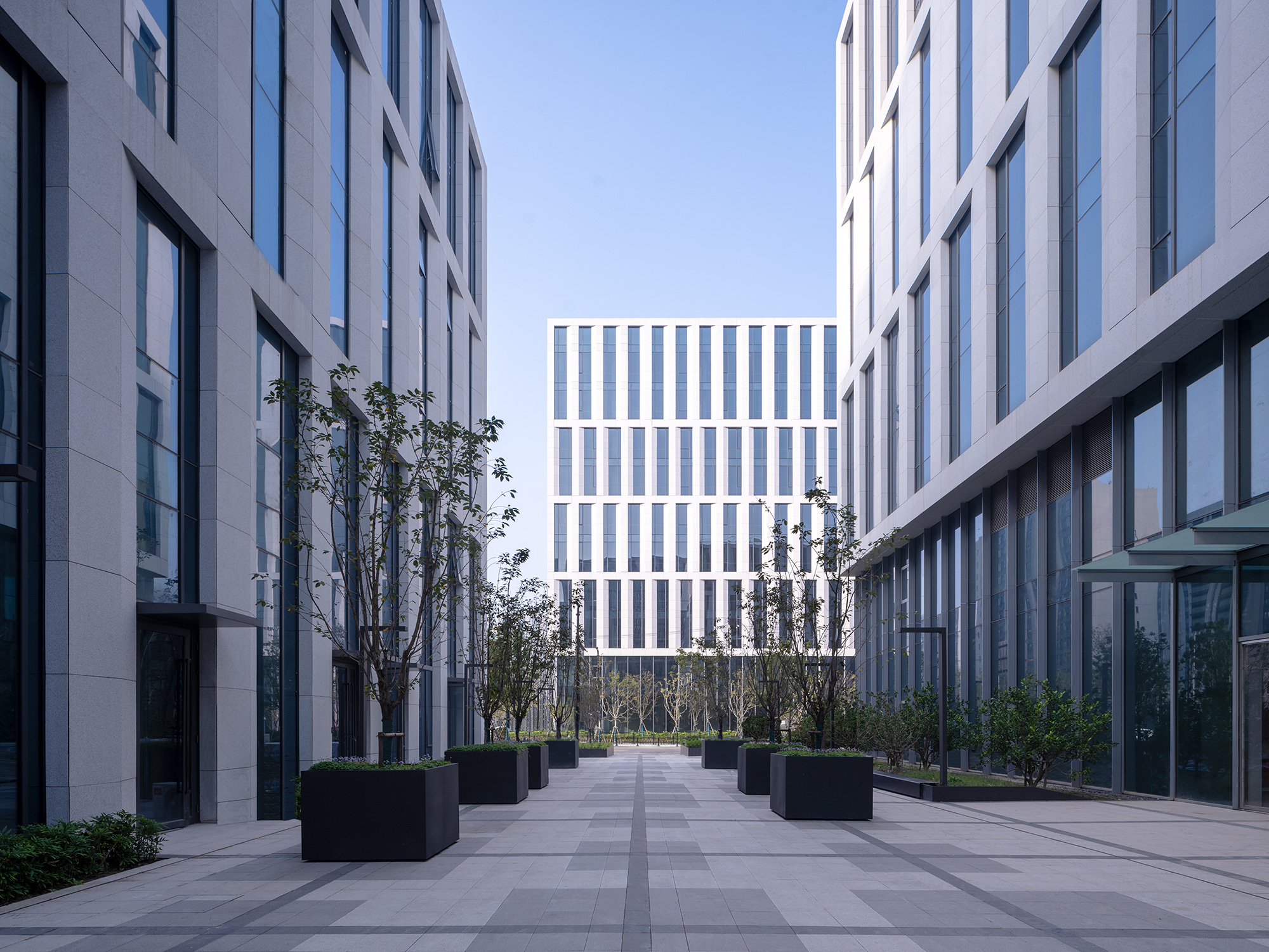 A courtyard between large buildings.