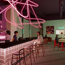 A group of people sitting at a bar.