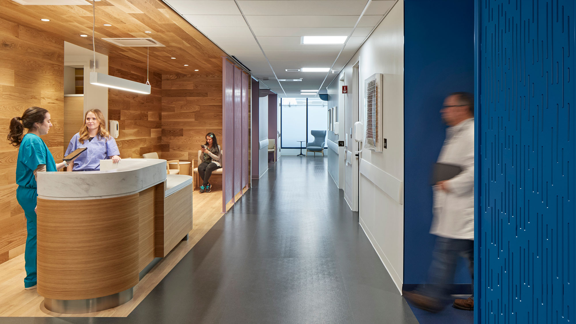 A group of people in a room.