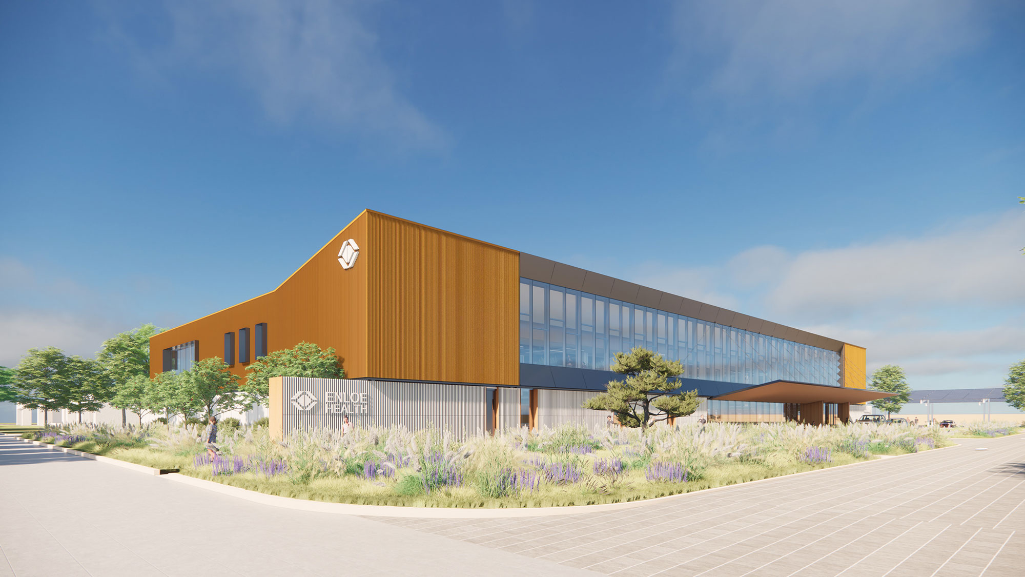 A building with a garden in front.