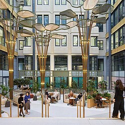 A building with a tall glass front.