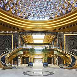 A large ornate building with a large staircase.
