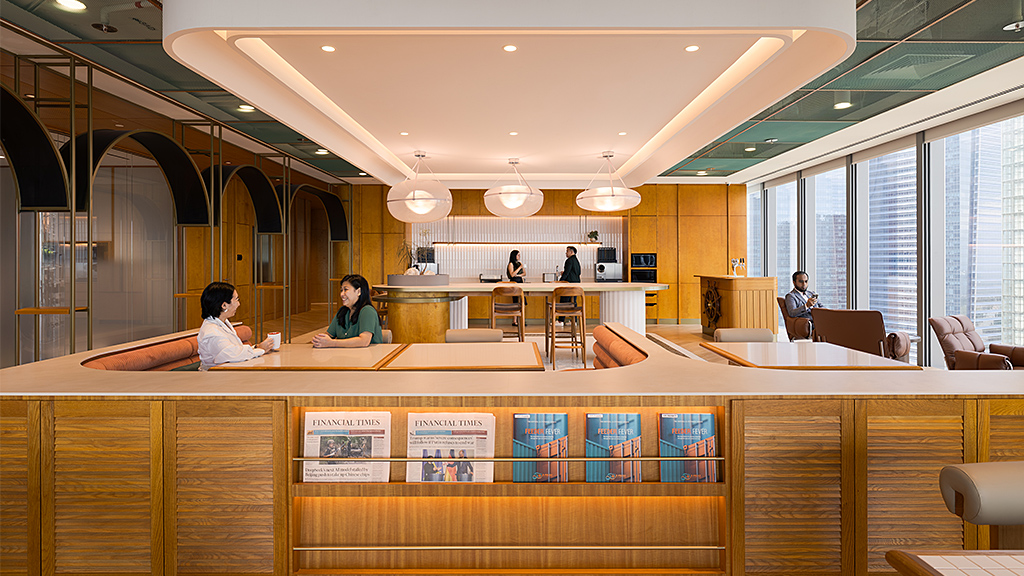 A group of people in an office pantry.