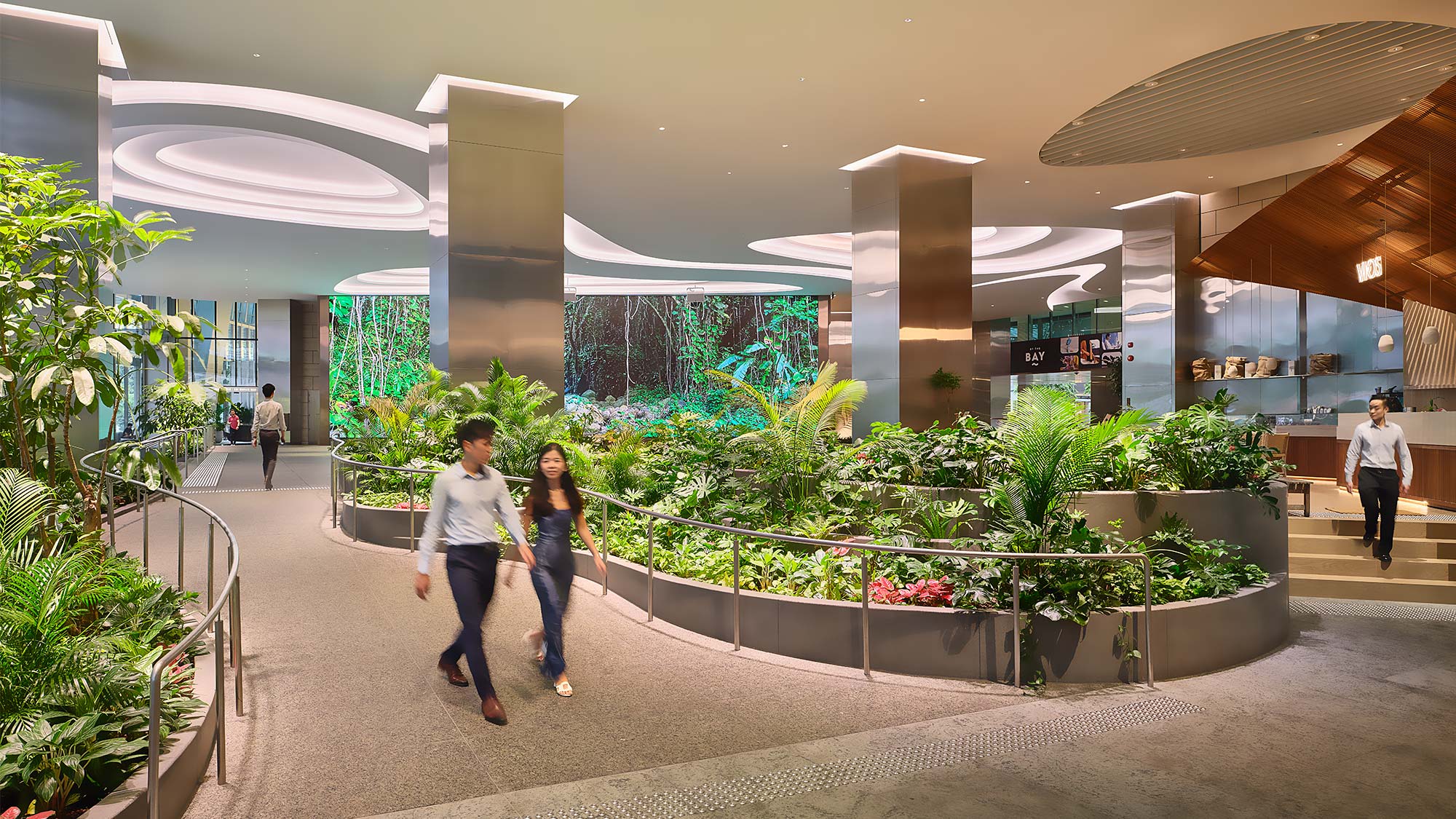 People walking in a mall.