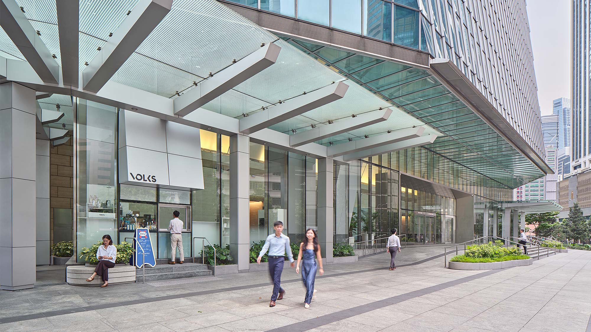 People walking outside a building.
