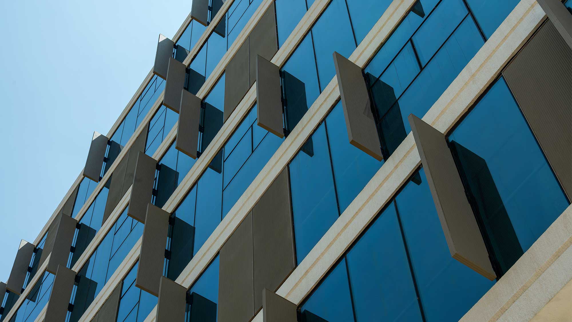 Looking up at a building.