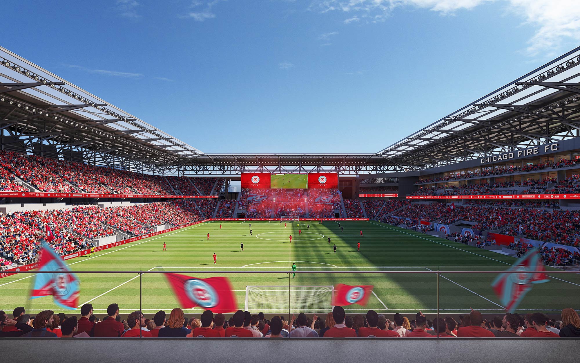 A sports stadium with a field and a field with people in it.